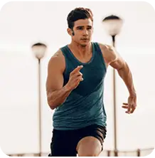 man running using Inductivv Headphones